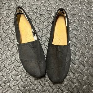 Black Toms flats